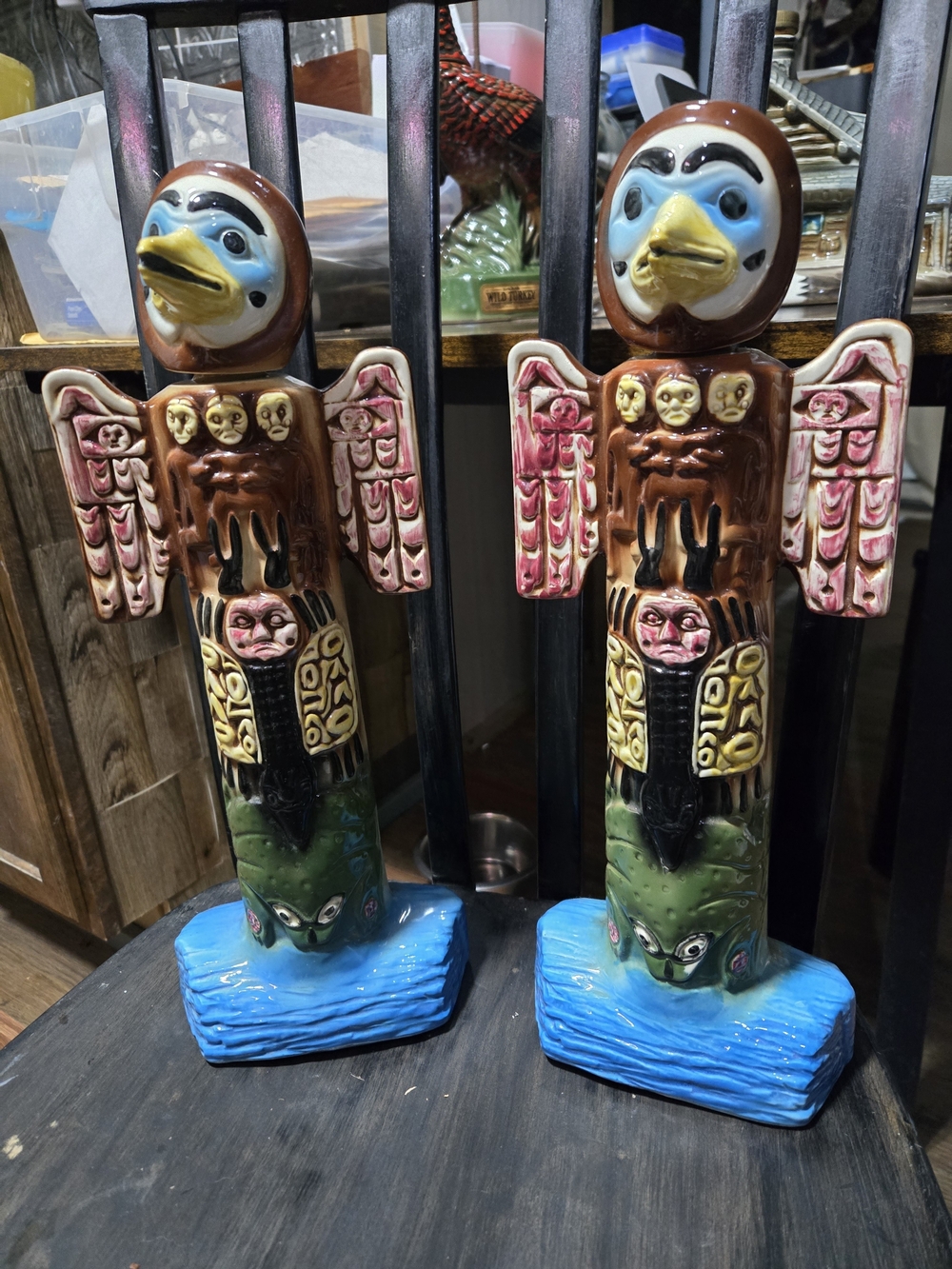 A pair of 1973 Ezra Brooks decorative whiskey decanter totem poles